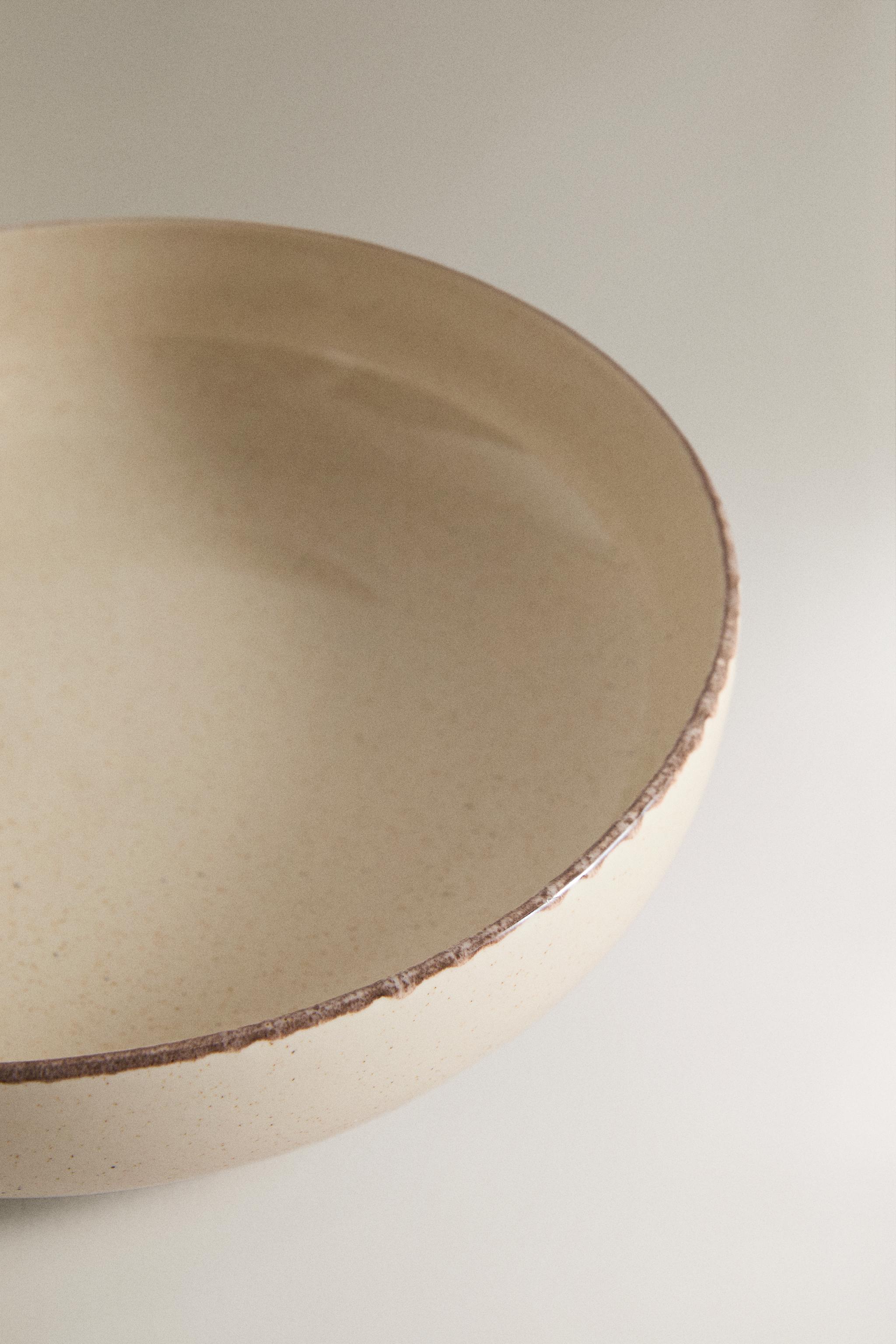 STONEWARE SOUP PLATE WITH AGED RIM